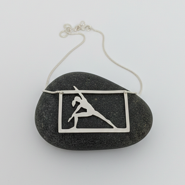 Pilates Side stretch reaching out necklace - sterling silver on a black stone white background.