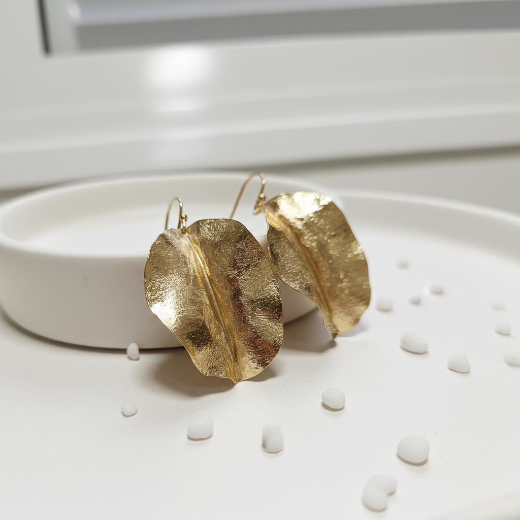 Gold leaf earrings product photo